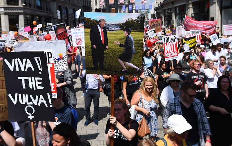 'Stop Trump' demonstrators march through Regents Street in London, as part of the protests against the visit of US President Donald Trump to the UK&nbsp;