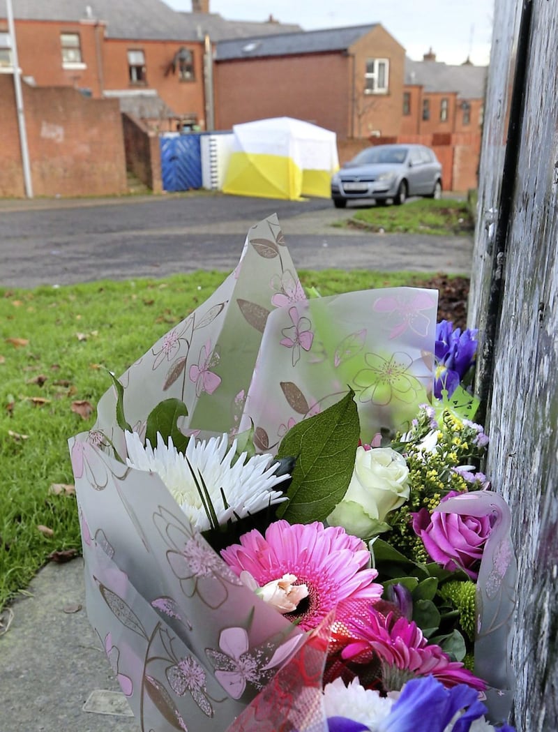Tributes at the scene in Derry where the body of Eddie Meenan was found on Sunday morning. Picture by Margaret McLaughlin 