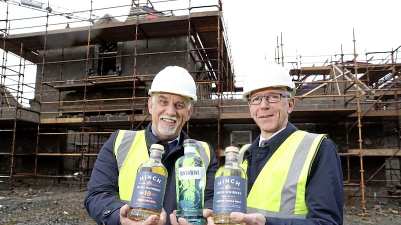 Hinch Distillery managing director, Derek Hardy (left), with Invest NI&#39;s Brian Dolaghan (right) 