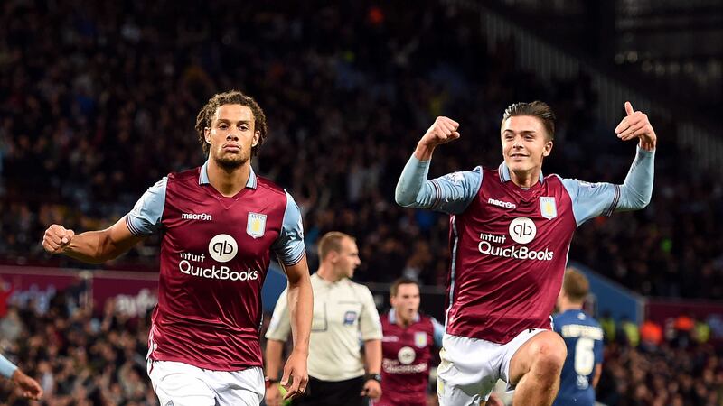 Aston Villa's Rudy Gestede celebrates with Jack Grealish after scoring the winner in Tuesday's Capital One Cup derby against Birmingham at Villa Park<br />Picture: PA