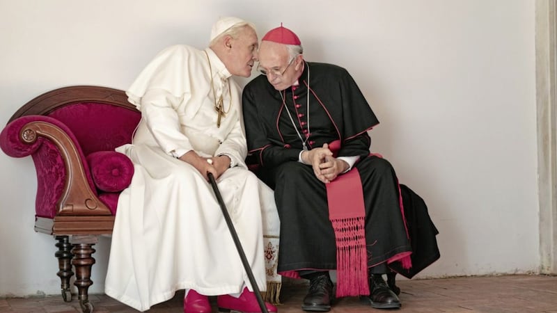 Anthony Hopkins (left) as Pope Benedict and Jonathan Pryce as Cardinal Jorge Mario Bergoglio in Two Popes 