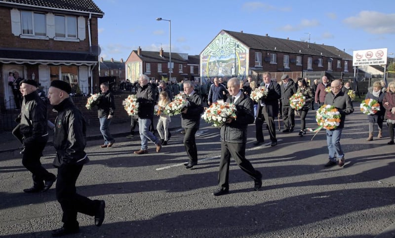 A parade makes its way to the unveiling of a memorial to those from the Ardoyne area who died during the Troubles. Picture by Cliff Donaldson.