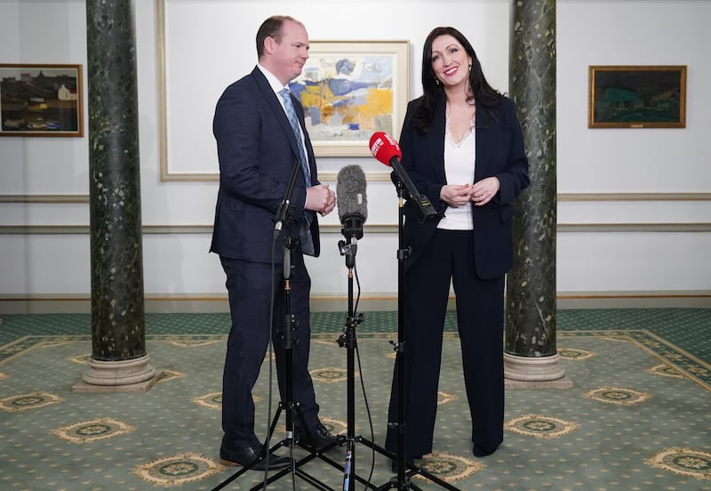 Communities Minister Gordon Lyons and Deputy First Minister Emma Little Pengelly speak to reporters in Dover House .