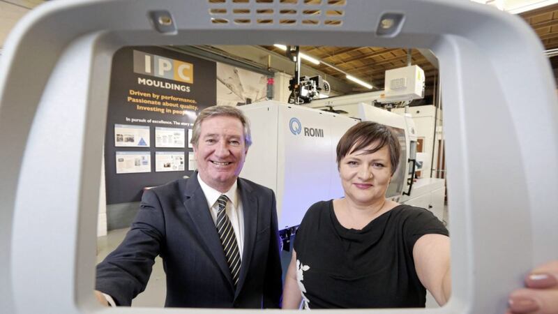 Announcing the major investment at IPC Mouldings are Bill Montgomery, Invest NI, and Joanne Liddle, IPC Mouldings. 
