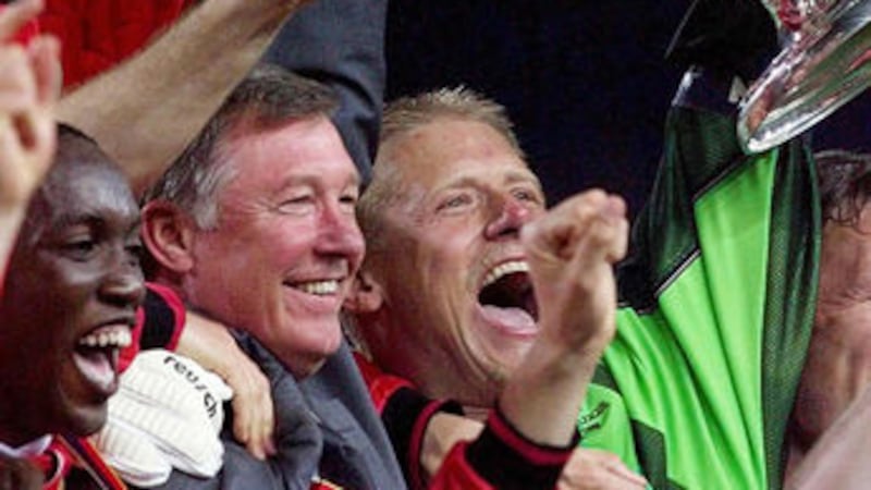 Manchester United striker Dwight Yorke (left) celebrating with the European Cup alongside United boss Alex Ferguson and goalkeeper Peter Schmeichel. The journal all began with a thrilling 3-3 draw with Barcelona&nbsp;