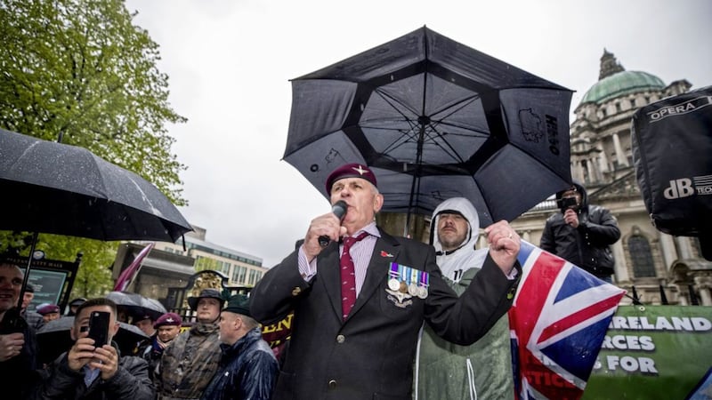 John Ross, a Parachute Regiment veteran, addresses protesters outside Belfast city hall during a rally for soldier F, a former paratrooper who is due to stand trial for murder and attempted murder for his role in the 1972 Bloody Sunday killings. Picture by Liam McBurney, Press Association