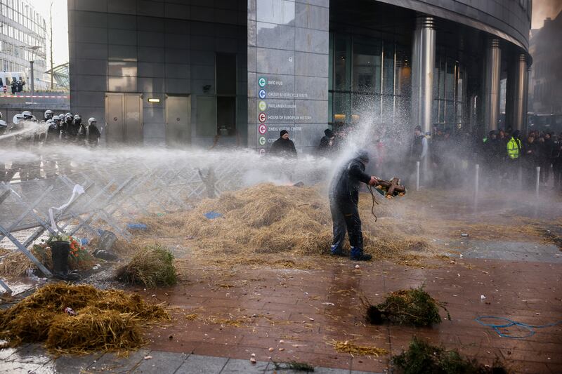 Anti-riot police used water to disperse people (Thomas Padilla/AP)