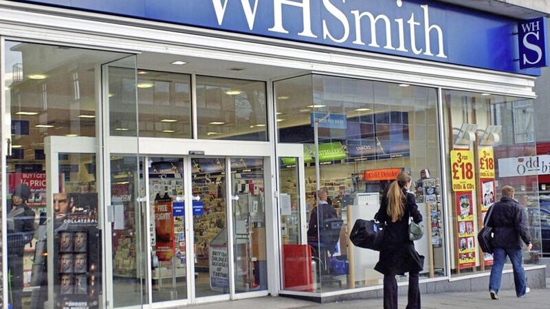 WH Smith says its high street sales continue to be offset by its growing chain of shops based at airports and railway stations as it reported flat sales over the last quarter 