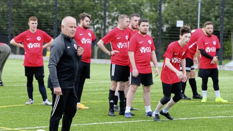 Cumann Spoirt An Phobail disability coach Kevin McVeagh during a training session last September. McVeagh feels the Stormont Executive needs to give them a date so their players can return to play Picture Mal McCann 