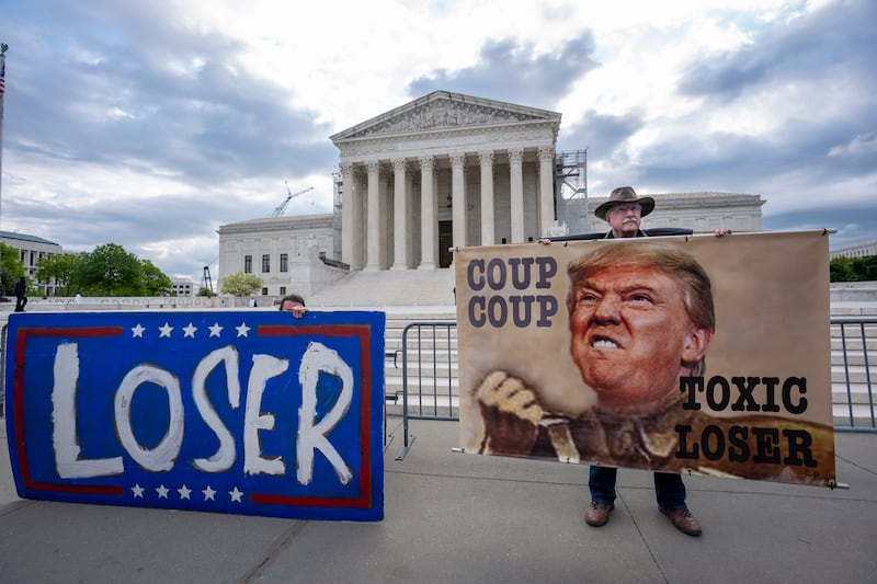 Activist Stephen Parlato joins other protesters outside the Supreme Court (J. Scott Applewhite/AP)