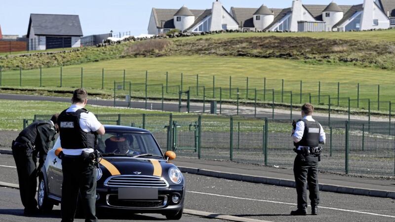 Police officers stopping vehicles between Portrush and Portstewart to check if people are making only essential journeys