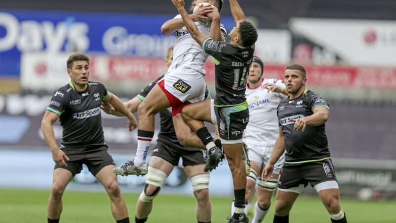 Charles Piutau takes the ball from Keelan Giles during the penultimate Guinness PRO12 League clash between the Ospreys and Ulster Rugby at the Liberty Stadium on Saturday Picture by John Dickson / www.dicksondigital.com 