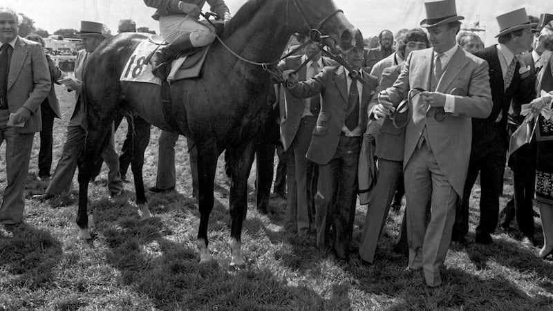 Shergar during the lead in by owner Aga Khan (top hat) with jockey Walter Swinburn after winning the Derby Stakes Classic at Epsom 