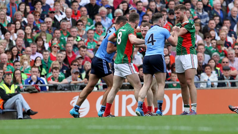 Dublin's Philip McMahon and Mayo's Aidan O'Shea get to grips with one another during Sunday's All-Ireland Senior Football Championship semi-final at Croke Park<br/>Picture: Colm O'Reilly&nbsp;