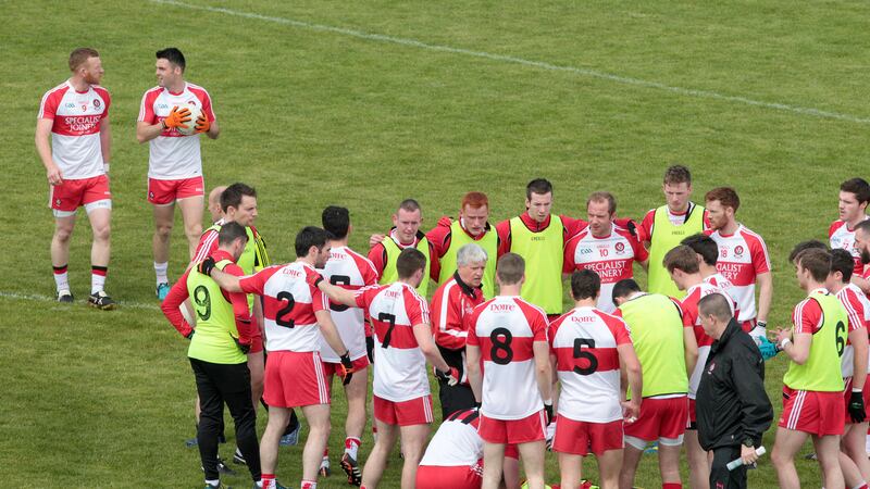 <span style="font-family: Arial, sans-serif; ">Brian McIver gives some final instructions before the start of Derry's match against Down in the Ulster Senior Championship quarter-final at Celtic Park</span>&nbsp;