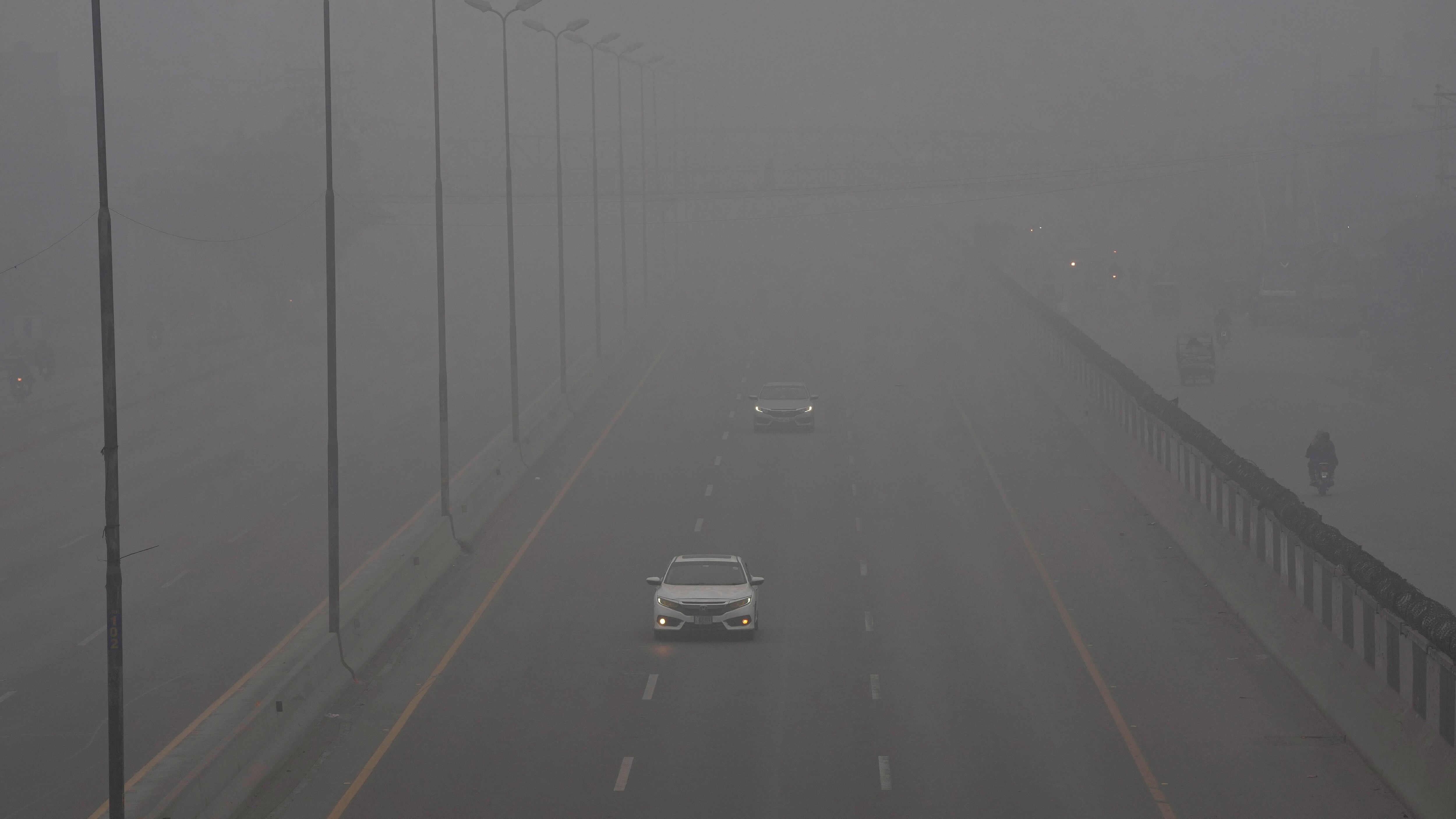 Smog enveloping Lahore has caused health problems for its people (KM Chaudary/AP)