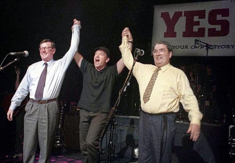 Unionist leader David Trimble, SDLP leader John Hume and Bono and U2 on stage in Belfast in 1998, before the Good Friday Agreement referendum. Picture by Paul Faith 
