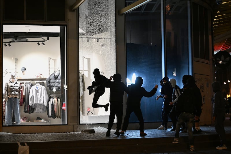 Police issue overnight curfew in parts of Paris to try and curb further disorder