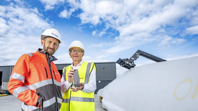 Pictured next to a decommissioned blade at Orsted&rsquo;s Owenreagh wind farm in Co Tyrone are Ray O&rsquo;Connell from Orsted and Andrew Billingsley from Plaswire. Picture: Brian Morrison 