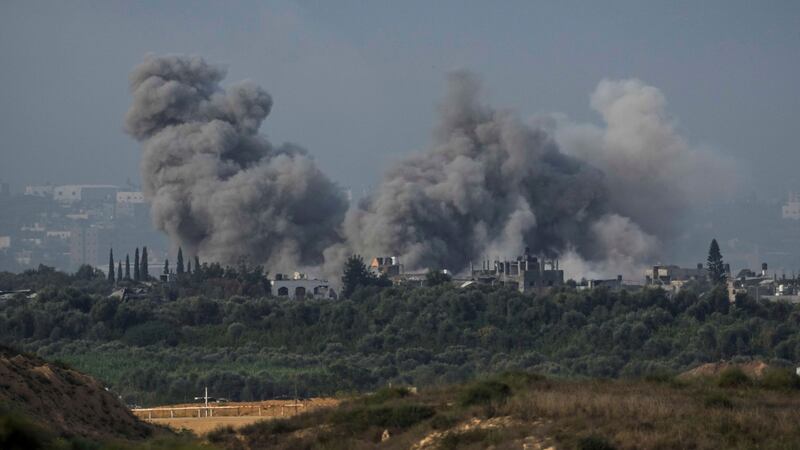 Smoke rises following an Israeli airstrike in the Gaza Strip (Leo Correa/AP)