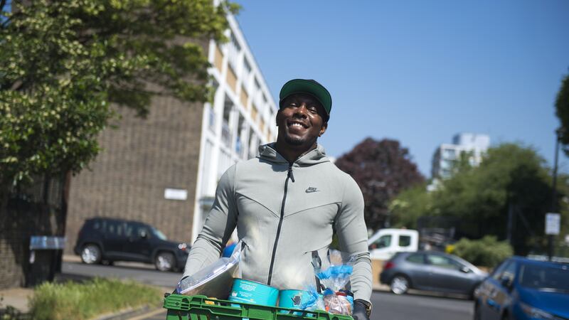 The rapper was volunteering at a primary school in east London.
