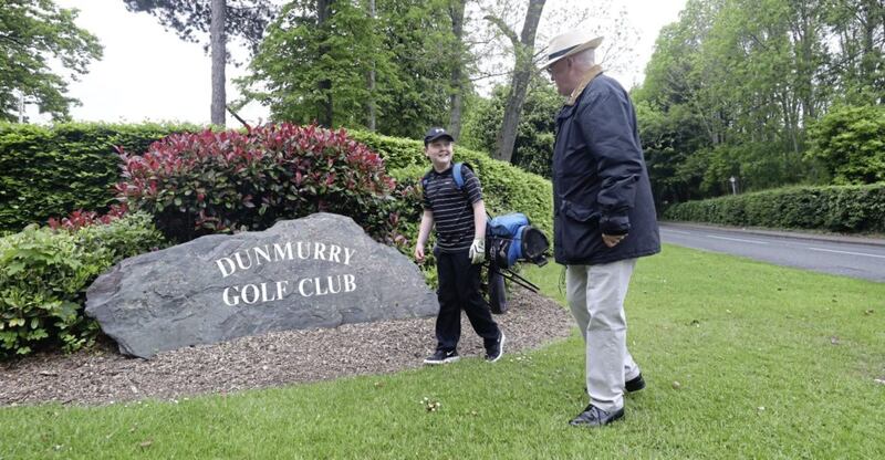 Aaron O'Reilly (11) with his grandfather Kevin arrive at Dunmurry Golf Club in Belfast. Picture by Niall Carson, Press Association