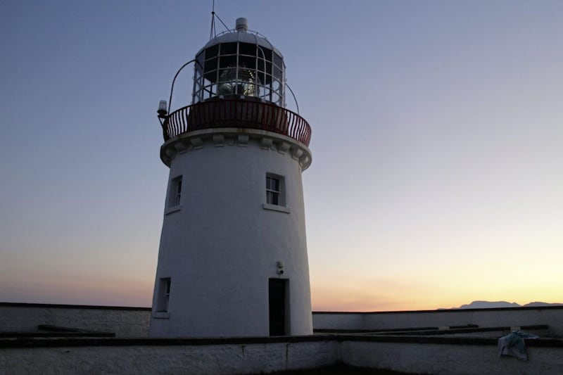 The sun sets over St John&#39;s Point lighthouse Picture: John Manley 