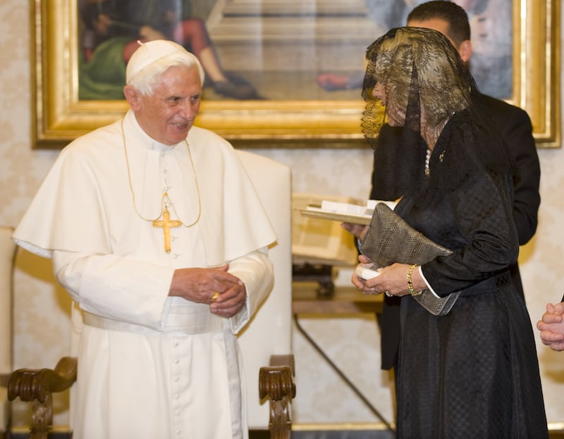 File photo dated 27/04/09 of the then Duchess of Cornwall (now the Queen Consort) with Pope Benedict XVI in the library at the Vatican. Pope Emeritus Benedict XVI has died, the Vatican has announced.