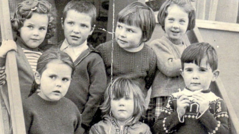 Pupils pictured on the steps of Bunscoil Phobal Feirste, a one-room portacabin on the Shaw&#39;s Road 