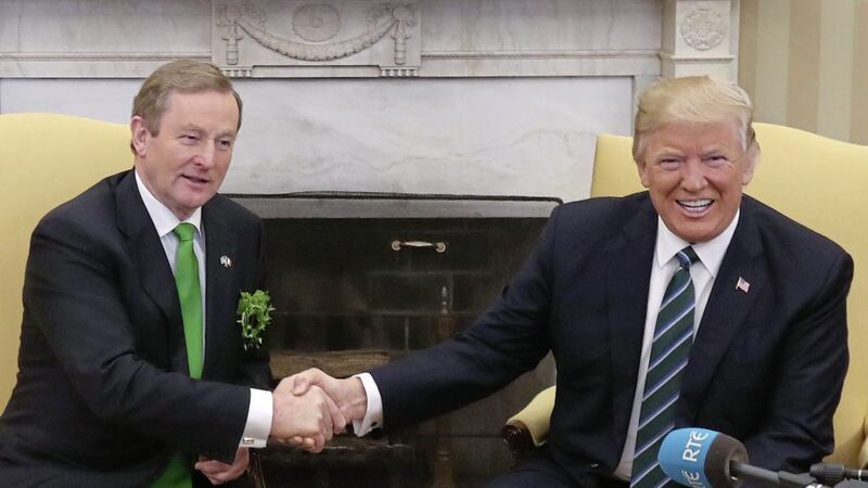 President Donald Trump and Taoiseach Enda Kenny meet for talks in the Oval Office of the White House in Washington, March 16, 2017. Photo Niall Carson/PA Wire. 