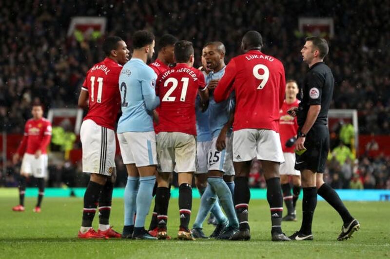 Manchester United and Manchester City players during a Premier League game