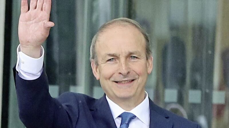 Fianna F&aacute;il leader Miche&aacute;l Martin leaves the Dail - in the Convention Centre, Dublin where he has been elected as the new Irish premier and officially voted in as the new taoiseach. Picture by Niall Carson/PA Wire