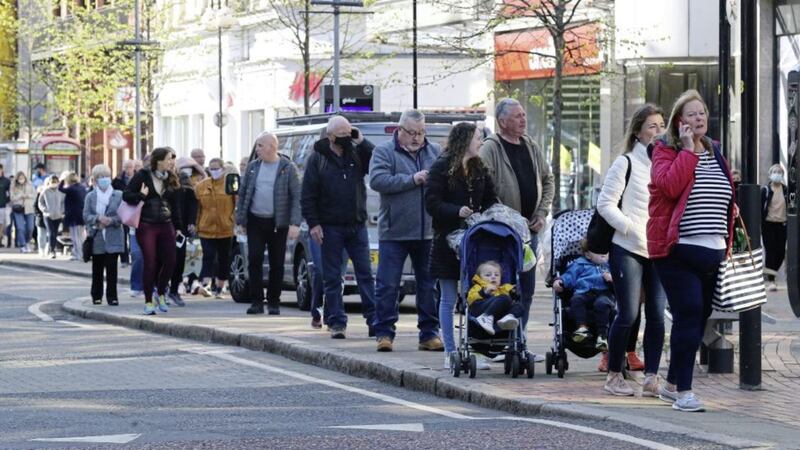 Shoppers queuing in Belfast city centre on Friday after the reopening of non-essential retail. Picture by Hugh Russell. 