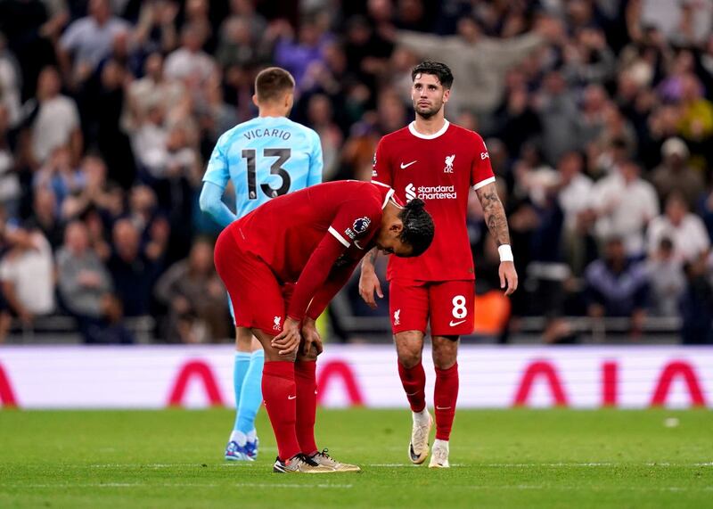 Virgil Van Dijk hangs his head at the end of Liverpool's loss to Tottenham