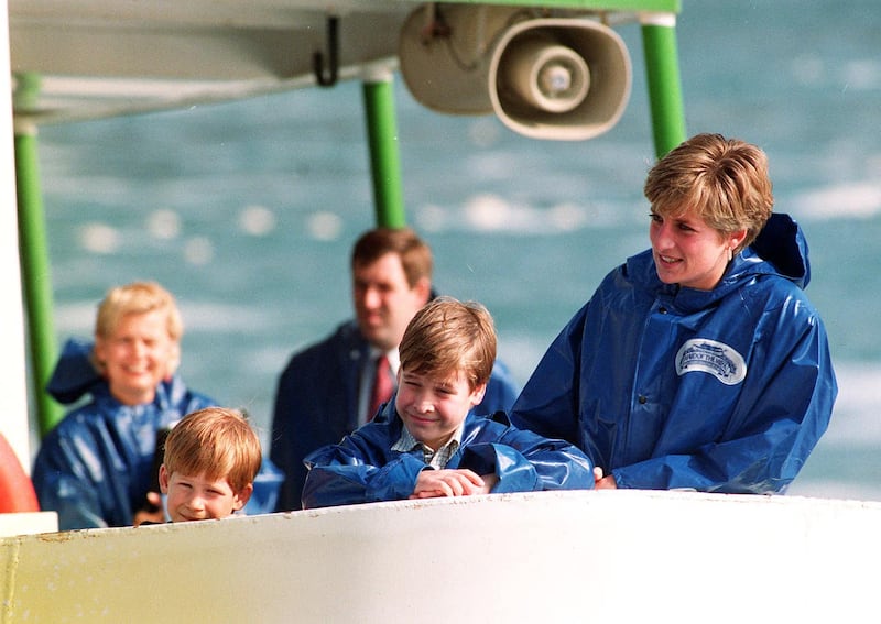 The Princess of Wales with her children, Prince William, 9, and Prince Harry, 7, on board the Maid of Mist for a close-up look at Niagara Falls