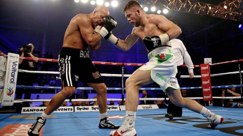 BANG ON THE MONEY: Conrad &lsquo;Dynamite&rsquo; Cummings (right) takes on German Ronny Mittag at the Wembley Arena on Friday night 
