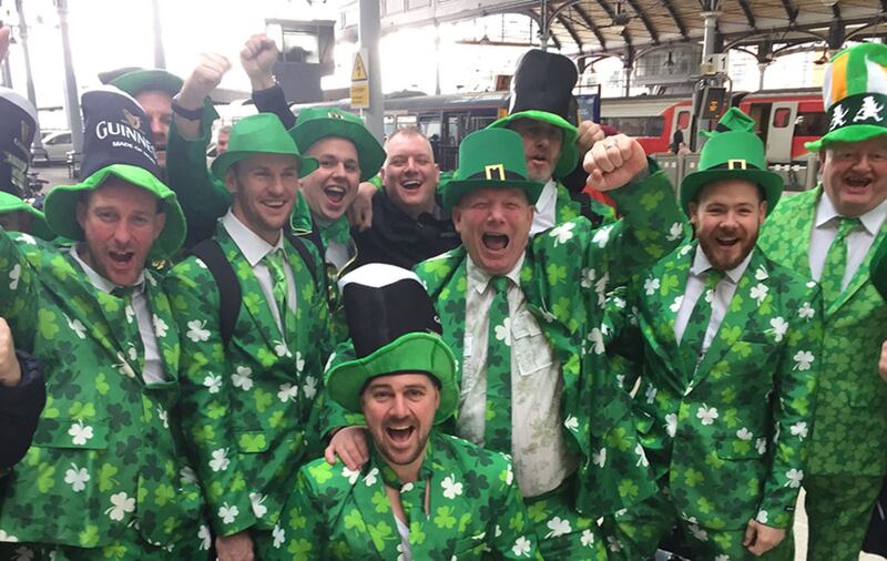 A group of men dressed in green suits on St Patrick's Day at Newcastle-Upon-Tyne railway station&nbsp;