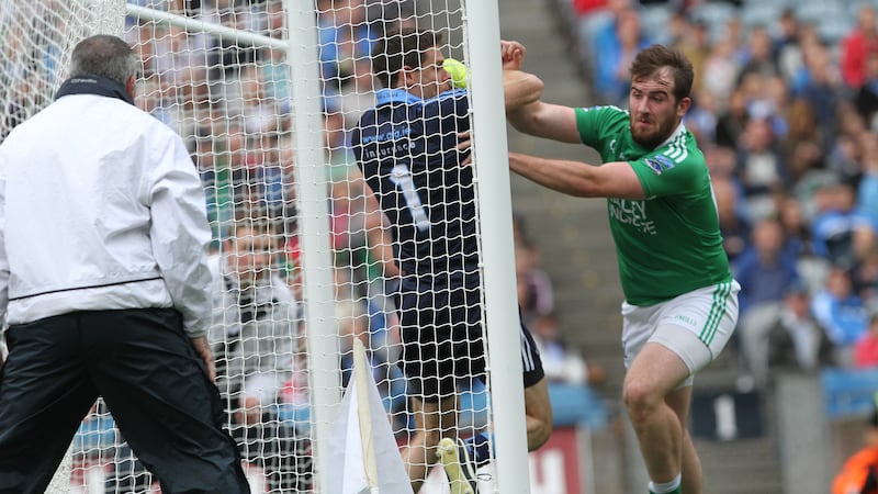 Fermanagh's Se&aacute;n Quigley forces Dublin 'keeper Stephen Cluxton over the goal-line to secure the Erne men a late goal in Croke Park on Sunday<br/>Picture: Colm O'Reilly