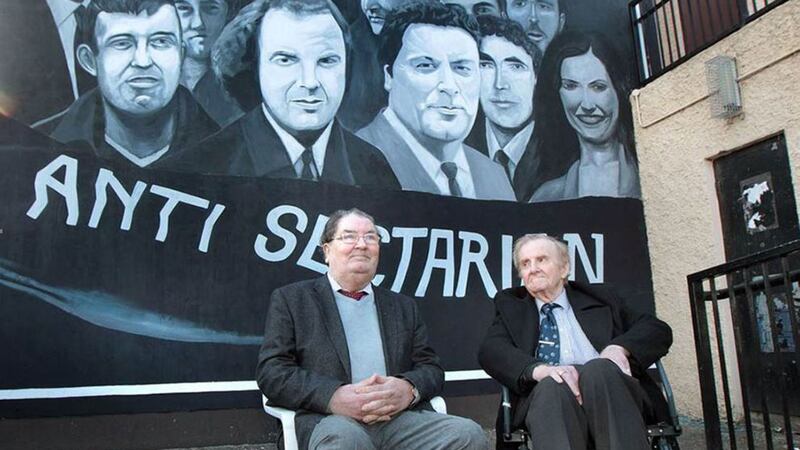 &nbsp;Ivan Cooper (right) and John Hume in front of a mural depicting a civil rights march. Picture by Margaret McLaughlin&nbsp;