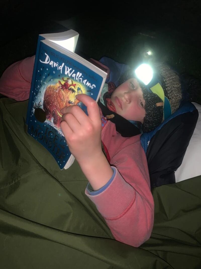 Archie Tunstill, aged eight, is to spend 100 nights sleeping in a bivvy bag in his garden in Suffolk for the Captain Tom 100. (Poppy Tunstill/ PA)