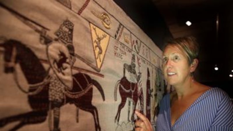 Kathryn Thomson from Ulster Museum looks at some of her own work on the Game of Thrones tapestry. Picture by Hugh Russell&nbsp;