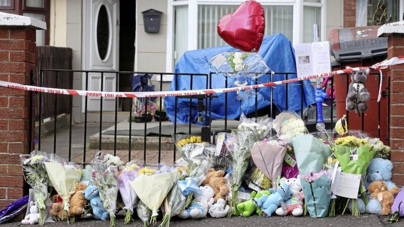 Flowers and toys outside the house in Ardoyne, north Belfast where a baby was killed last week. Picture by Mal McCann 