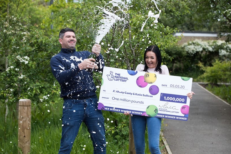 Handout photo dated 13/05/20 issued by the National Lottery of Anthony Canty, 33, from Maldon in Essex, who won �1 million in the Euromillions UK Millionaire Maker draw on May 5 celebrating with his partner Katie Sullivan