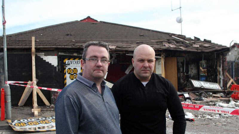 Arson attack at A2B Cabs and JJ's Barbers on the Glen Road Belfast owners Stephen Comerford and John Paul McCusker have thanked the community for their support. Picture by Ann McManus&nbsp;