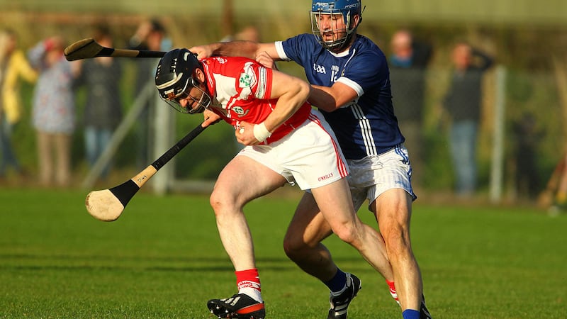 Loughgiel's Paul Gillan is challenged by St Gall's Se&aacute;n McAreavey during Saturday night's Antrim Championship quarter-final at Corrigan Park <br />Picture: S&eacute;amus Loughran&nbsp;