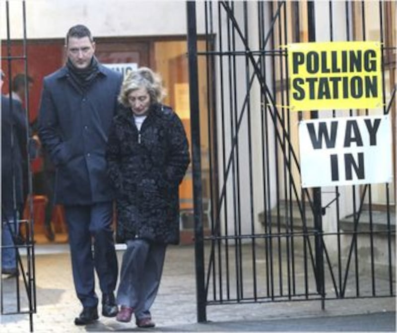 &nbsp;Sinn Fein north Belfast candidate John Finucane and his mother Geraldine cast their votes. Picture Hugh Russell