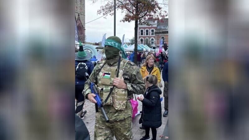 A picture appearing to show a person dressed in a Hamas outfit in Derry's Guildhall Square area. 