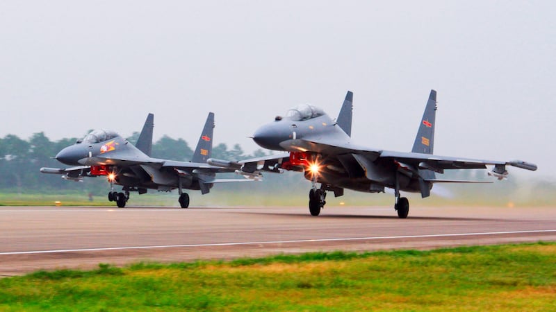 Taiwan’s defence ministry said China has sent navy ships and a large group of warplanes, including fighter jets and bombers, towards the island over two days (Jin Danhua/Xinhua/AP)