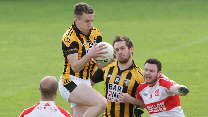 Crossmaglen's Stephen Morris in action against Tir na nOg  in the Armagh Senior Football Championship at the Athletic Grounds on Sunday<br />Picture by Colm O'Reilly
