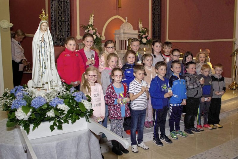 Children from St Joseph&#39;s Primary School in Galbally were presented with Rosary beads and a Fatima prayer card. Picture by Jim Hamill. 